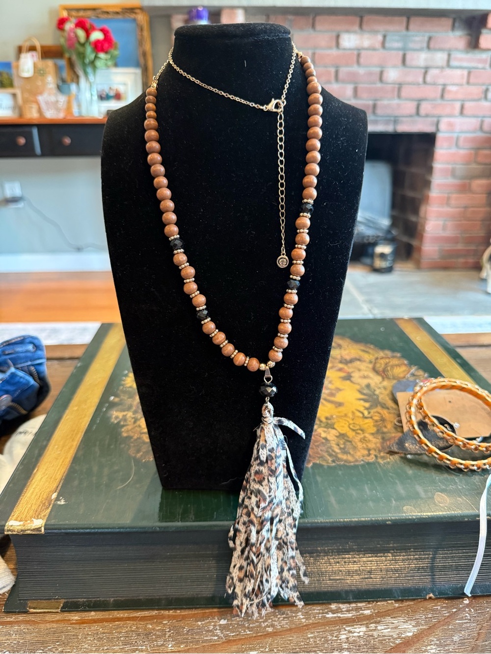 Cato Brown Wood Bead Necklace with Black Accents and Neutral Fabric Tassel